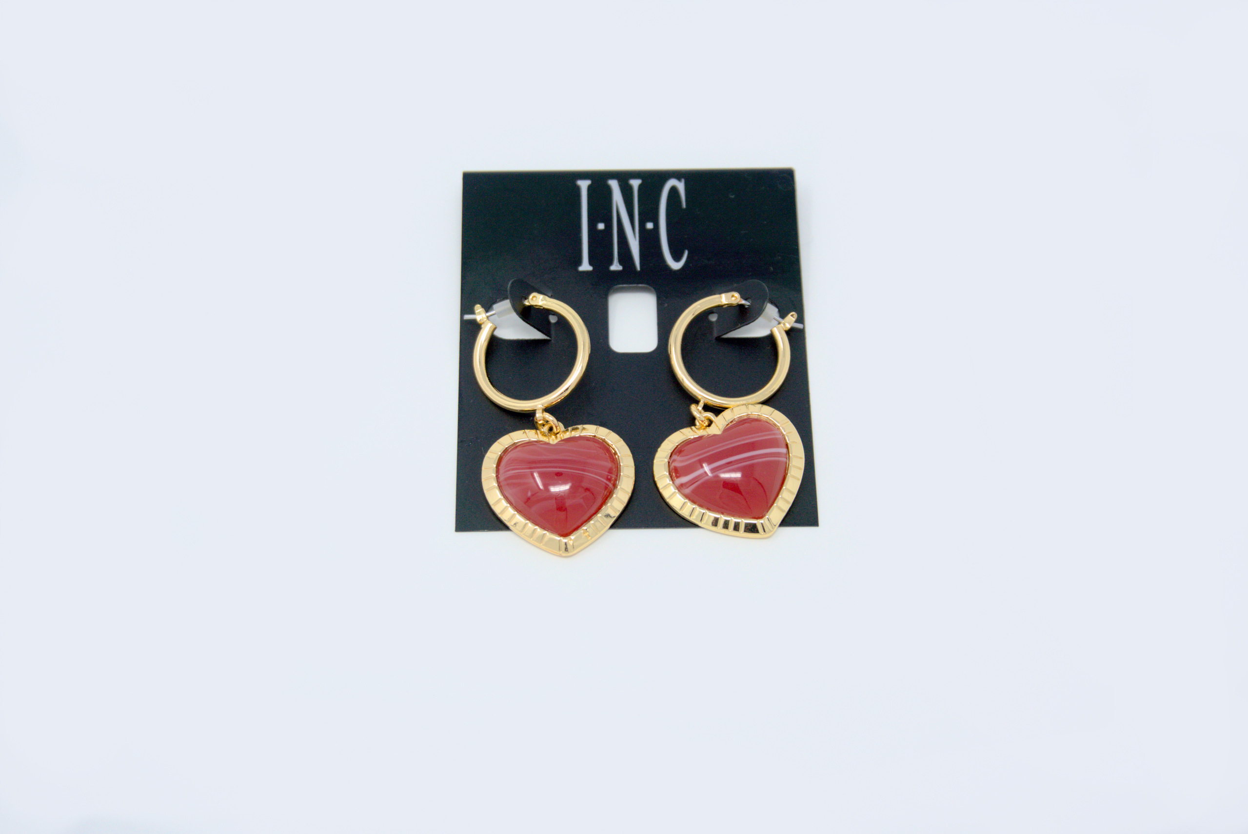 Charm & Lovely Quality Affordable Accessories introduces INC Gold-Tone Stone Heart Charm Hoop Earrings, Set in gold-tone mixed metal; epoxy, Approx. drop: 1-4/5", Click-top closure