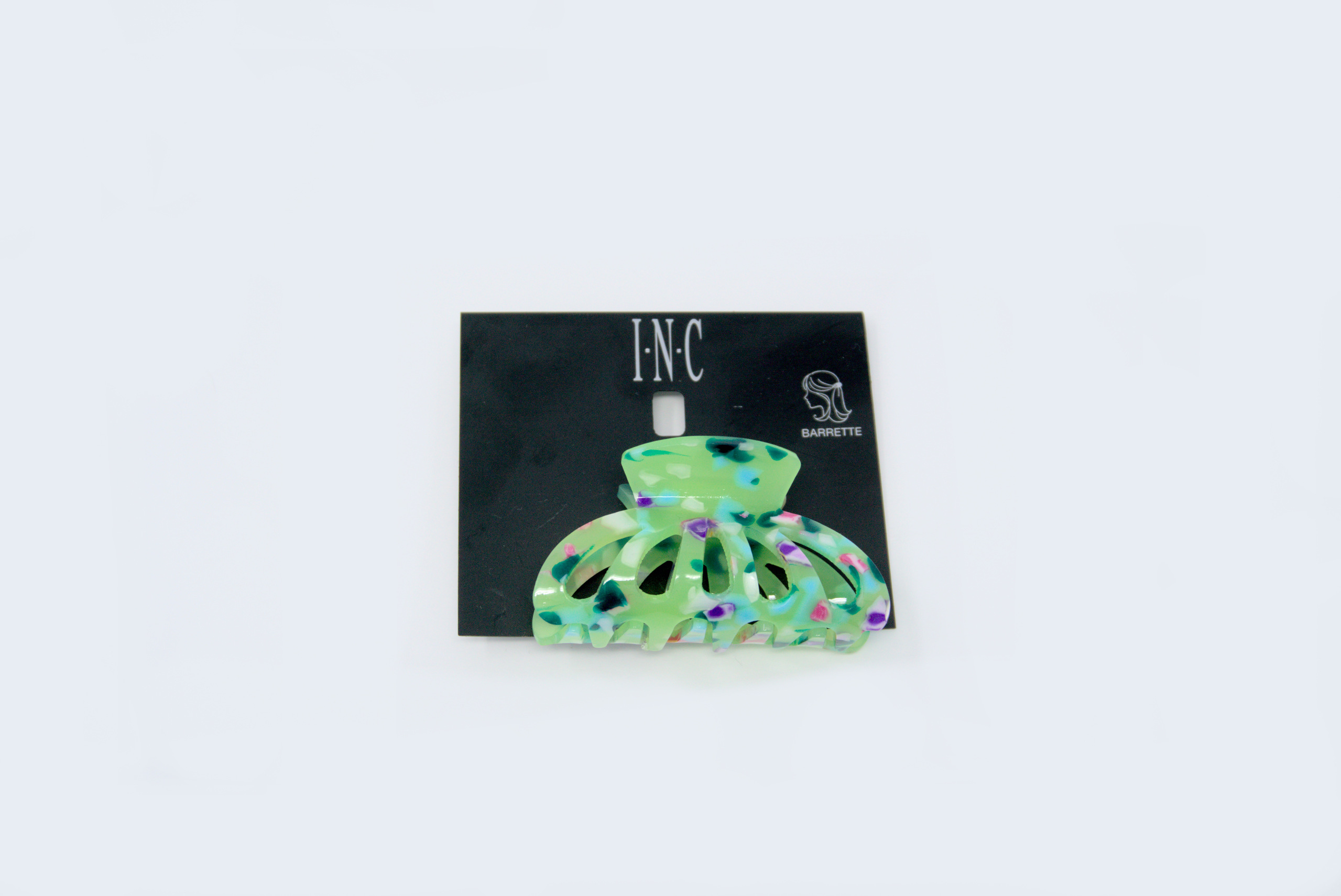 Charm and Lovely Quality Fashion Accessories introduces INC green color claw clip
